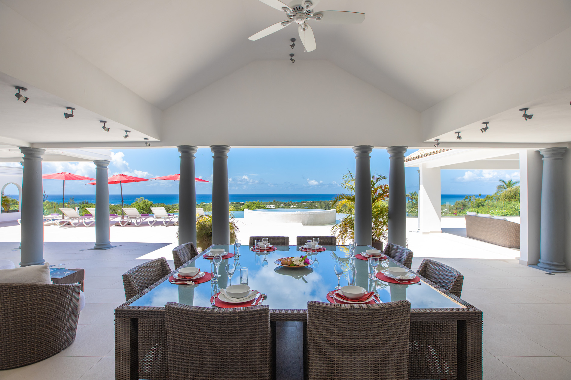 Outdoor dining overlooking the infinity pool